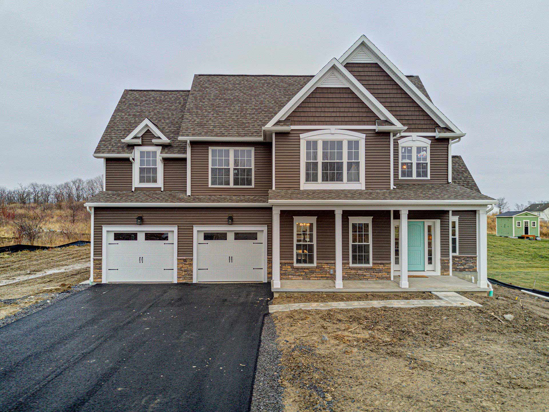 Two-storey Gerber home with a side-entry garage on Lacrosse Circle